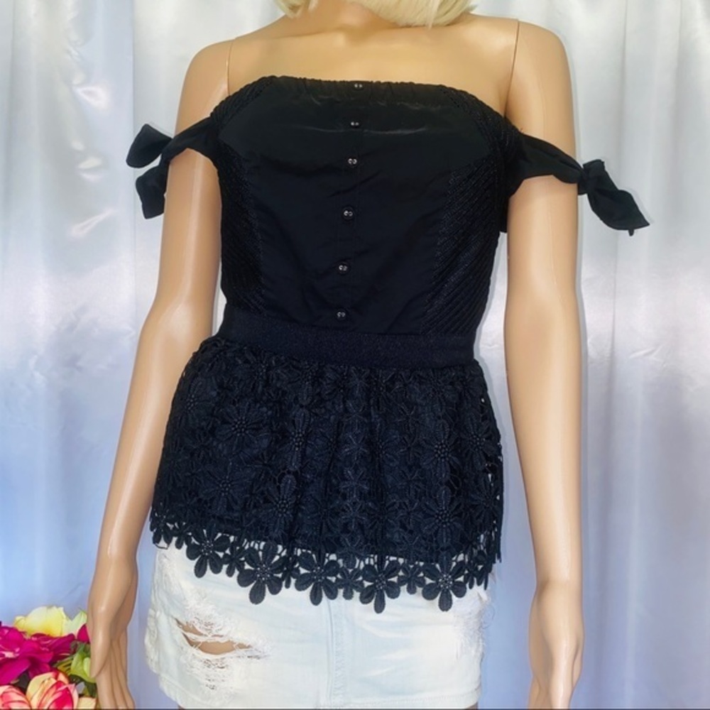 Francesca’s Floral peplum top